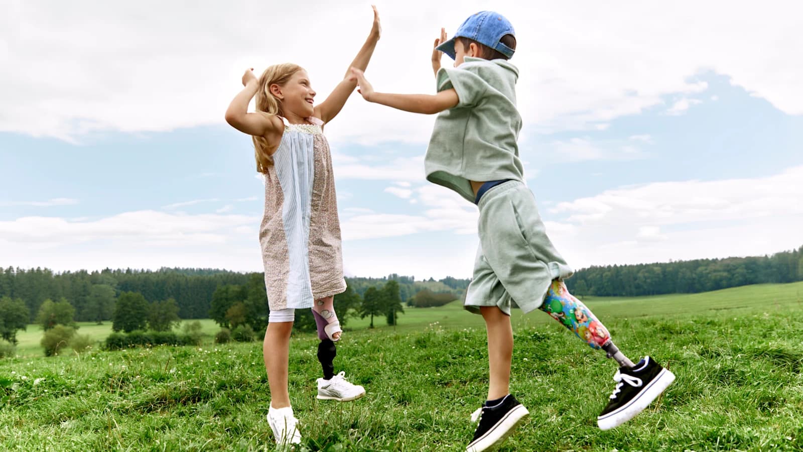 Child with a paediatric prosthesis playing