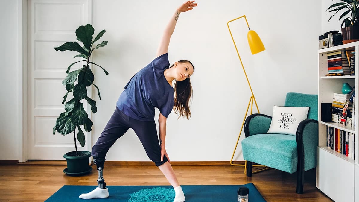 User doing yoga with the Taleo Vertical Shock foot