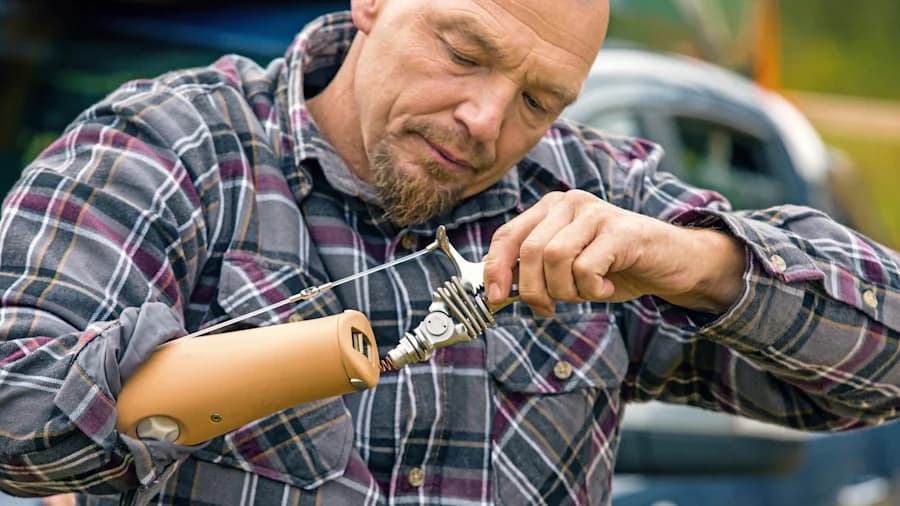 Body-powered prosthetic arms and hands